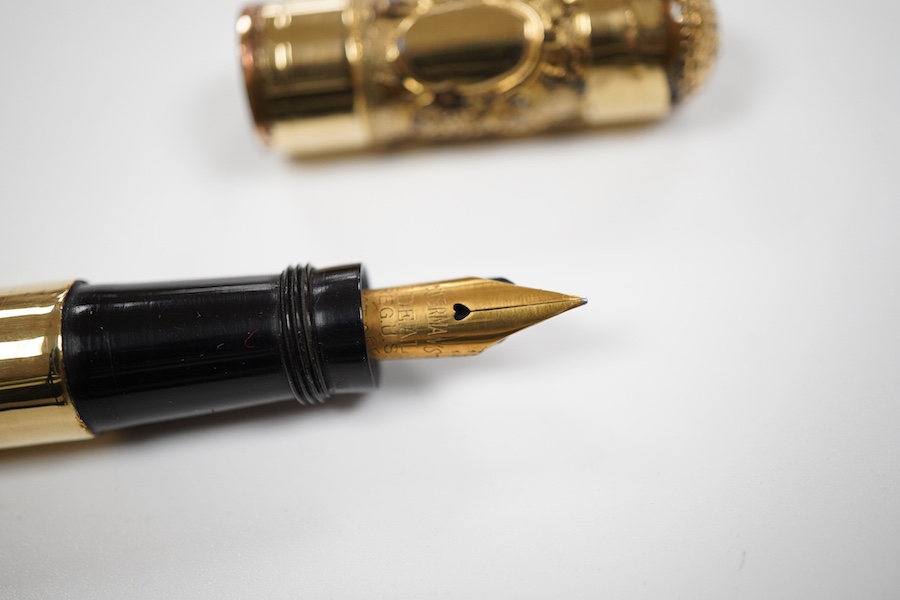 A Waterman No.42 'continental' safety with un unusual highly decorated cap top depicting female faces